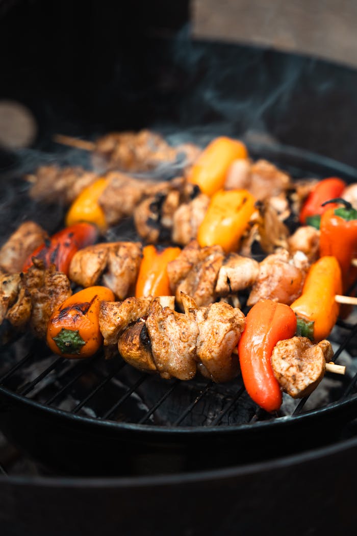 grilled-chicken-and-pepper-skewers-on-bbq-32973160